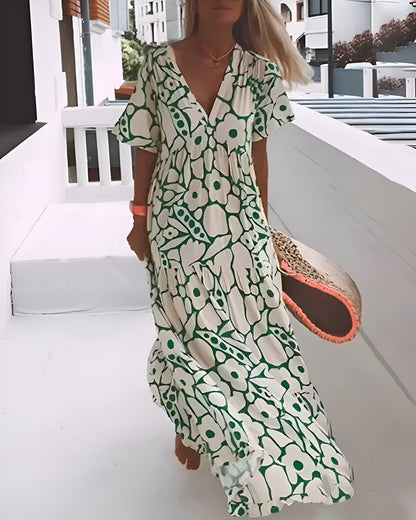 Florivana™ | Dames Maxi Jurk met Bloemenprint | Luchtige Zomerse V-Hals Jurk met Vlindermouwen en Zwierige Pasvorm