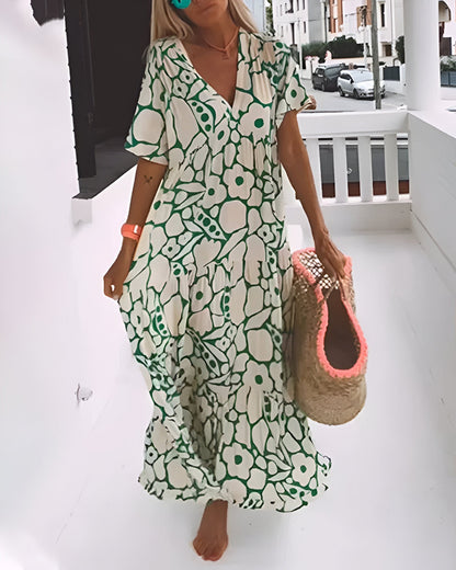 Florivana™ | Dames Maxi Jurk met Bloemenprint | Luchtige Zomerse V-Hals Jurk met Vlindermouwen en Zwierige Pasvorm