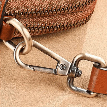 Eloria | Compacte Crossbodytas Met Bloemaccent