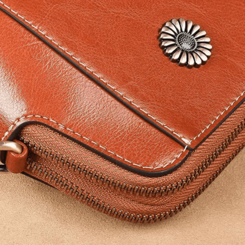 Eloria | Compacte Crossbodytas Met Bloemaccent