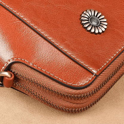 Eloria | Compacte Crossbodytas Met Bloemaccent