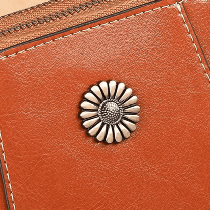 Eloria | Compacte Crossbodytas Met Bloemaccent