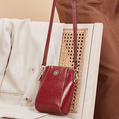 Eloria | Compacte Crossbodytas Met Bloemaccent